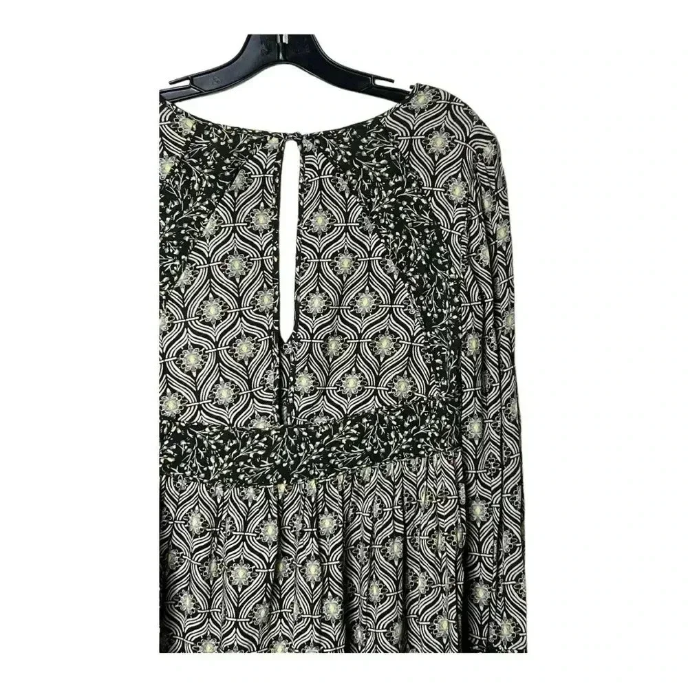 1514. FREE‎ PEOPLE ROLLING HILLS FLARED SLEEVE TOP SIZE XSMALL FLORAL PATTERN